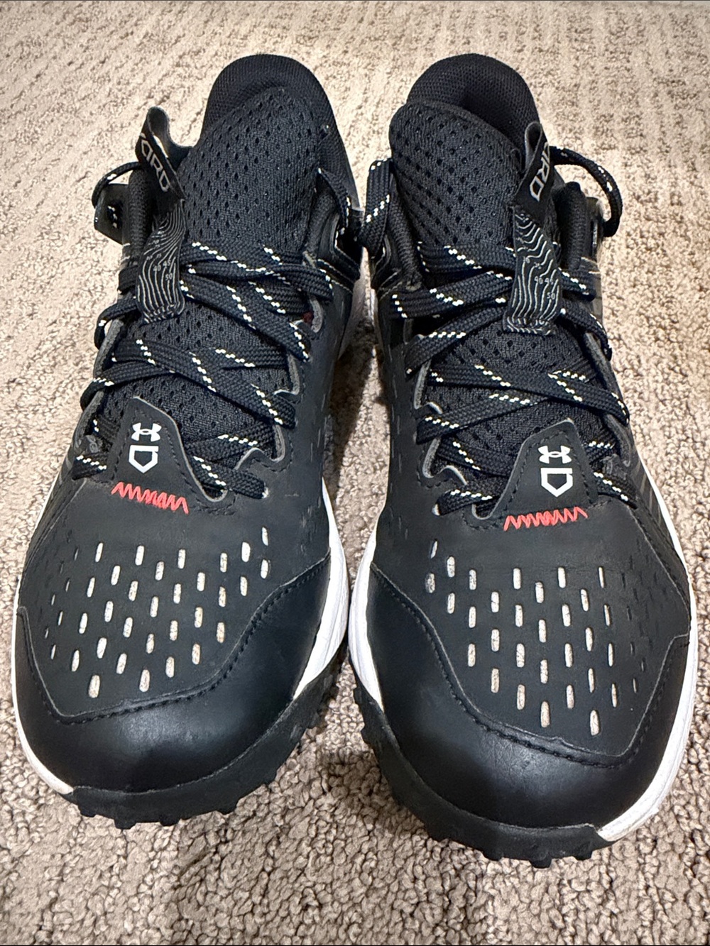 Under Armour: Youth Black and White Athletic Shoes with Red Accent